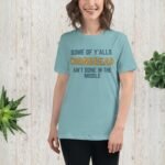 Funny Southern saying tee: “Some of y’all’s cornbread ain’t done in the middle.” Soft unisex shirt.